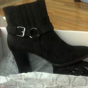 Black heeled boots, brand new never worn